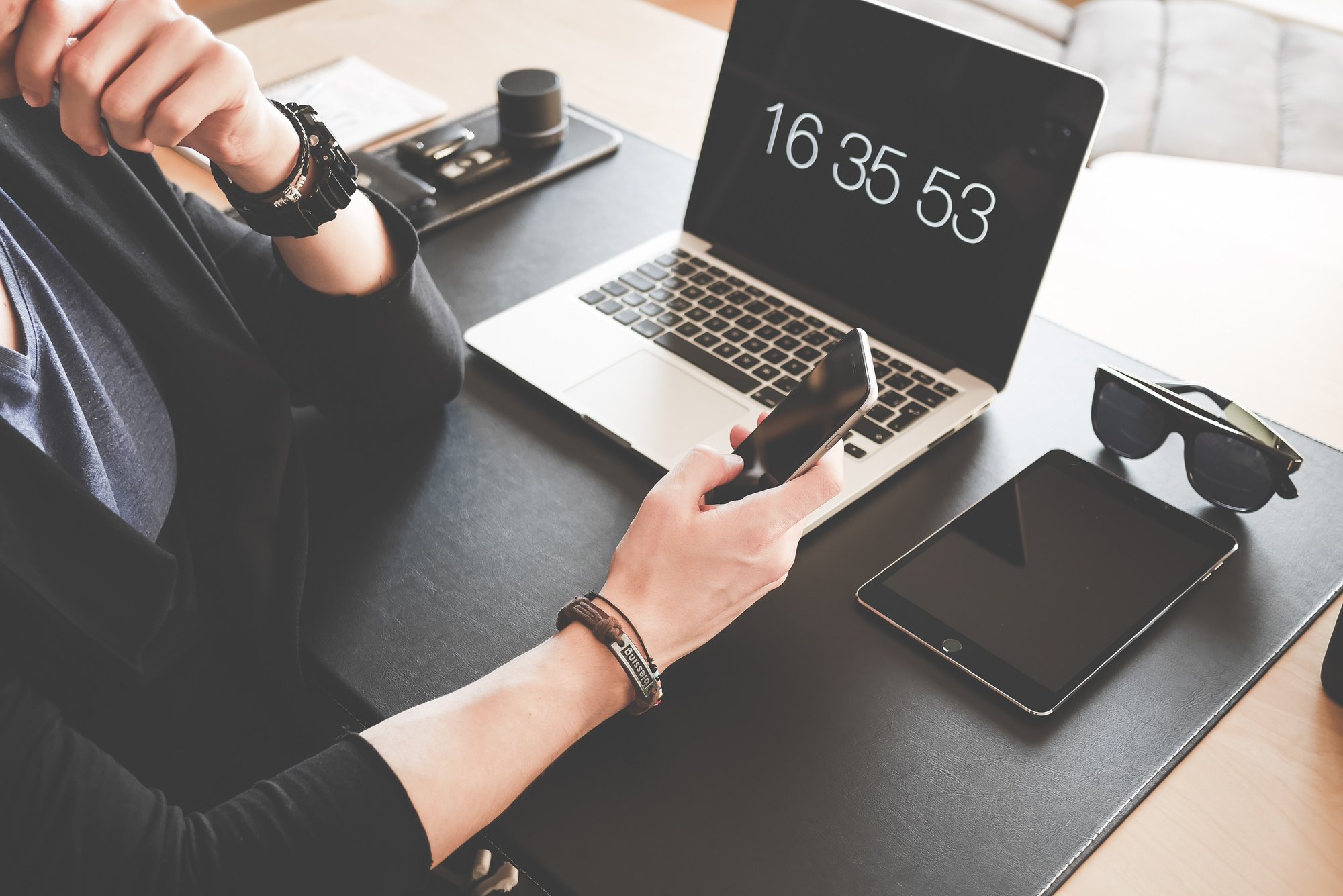 Person Working Sitting on Desk